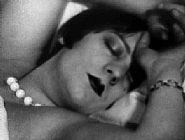 Man Ray - Kiki de Montparness (Kiki in Repose, cinema still from Etoile de Mare) (Photographs) h: 6 x w: 7.8 in / h: 15.2 x w: 19.8 cm