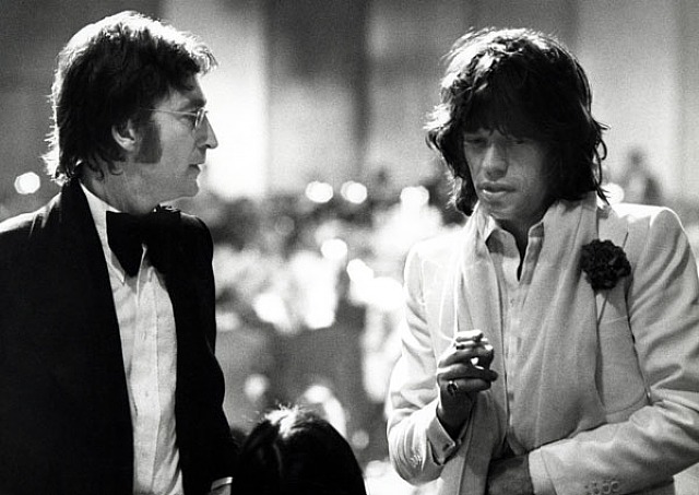  Ron Galella, John Lennon, Mick Jagger, and May Pang attend the AFI Salute to James Cagney at the Century Plaza Hotel, Los Angeles, CA, March 13, 1974