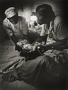 Nurse Midwife Delivering Baby