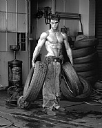 Herb Ritts - Fred with Tires, Hollywood (Photographs) h: 20 x w: 24 in / h: 50.8 x w: 61 cm