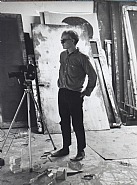 Andy Warhol Grinding Away at Filming in His Studio, September 5, 1964