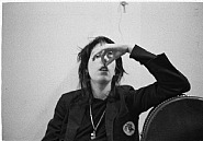 Patti holds nose