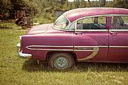 William Christenberry - Magenta Car, Havana, Alabama, 1976 (Photographs) h: 16 x w: 22 in / h: 40.6 x w: 55.9 cm