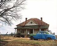 William Christenberry - House and Car, near Akron, Alabama (Photographs) h: 44 x w: 55 in / h: 111.8 x w: 139.7 cm