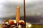 William Christenberry - Corn Sign with Storm Cloud, Near Greensboro, Alabama, 1977 (Photographs) h: 3.5 x w: 5 in / h: 8.9 x w: 12.7 cm