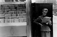 Louis Stettner - Elbowing an Out-of-Town Newsstand (Photographs)