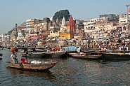 Man Sitting In Boat At Ghat