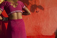 Woman Changing Into Dry Sari