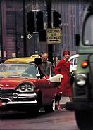 William Klein - Anne St. Marie and Cruiser in Traffic, NY (Photographs)
