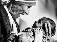 Eddie Adams - Mother Teresa cradling an armless baby orphan at her order's orphanage in Calcutta, India, 1978