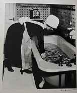 Bill Brandt - Parlourmaid Preparing a Bath, 1935