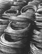 Margaret Bourke-White - Coiled rod, (ready for drawing into wire), Aluminum Co. of America (Photographs) h: 16 x w: 20 in / h: 40.6 x w: 50.8 cm