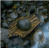Andy Goldsworthy - River boulder reworked with sticks raining, Woody Creek, Colorado (Photographs)