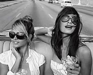 Giselle Karina Bacallao Moreno and Rachel (painter/artist/MD muse) going for a spin on the Malecon, Habana