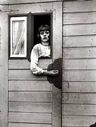 August Sander - Girl in a Circus Caravan (Photographs) h: 10 x w: 8 in / h: 25.4 x w: 20.3 cm