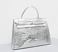 Sylvie Fleury - Not yet titled (Crocodile Kelly Bag) (Sculptures) h: 34 x w: 31.5 x d: 11.5 cm / h: 13.4 x w: 12.4 x d: 4.5 in