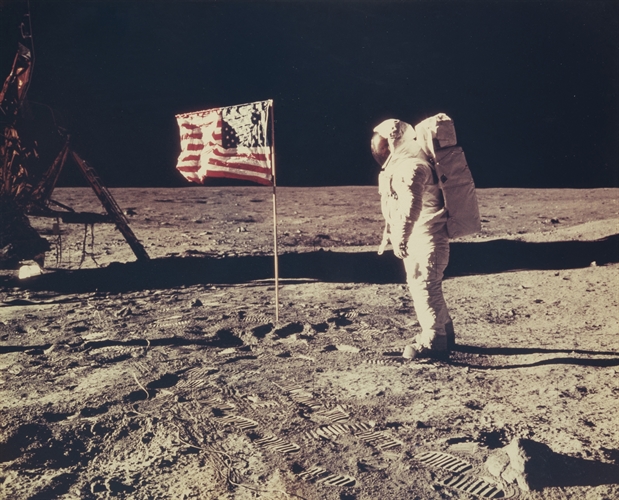 Photograph of Buzz Aldrin standing on the moon with the American flag ...