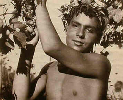 Sicilian girl with a bunch of grapes Photograph by Wilhelm Von Gloeden -  Fine Art America