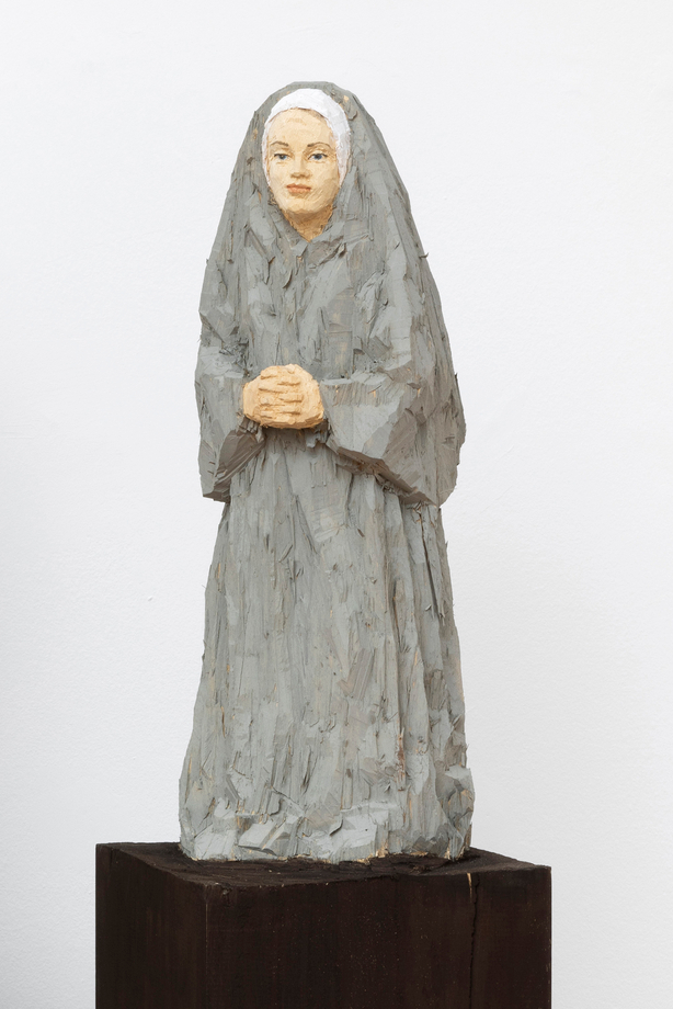 Sister with folded hands