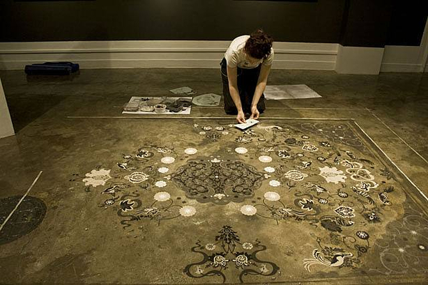 Hannah Bertram installing dust carpet entitled “An Ordinary Kind of Ornament” at “Fragments” exhibition at 10 Chancery Lane Gallery, Hong Kong