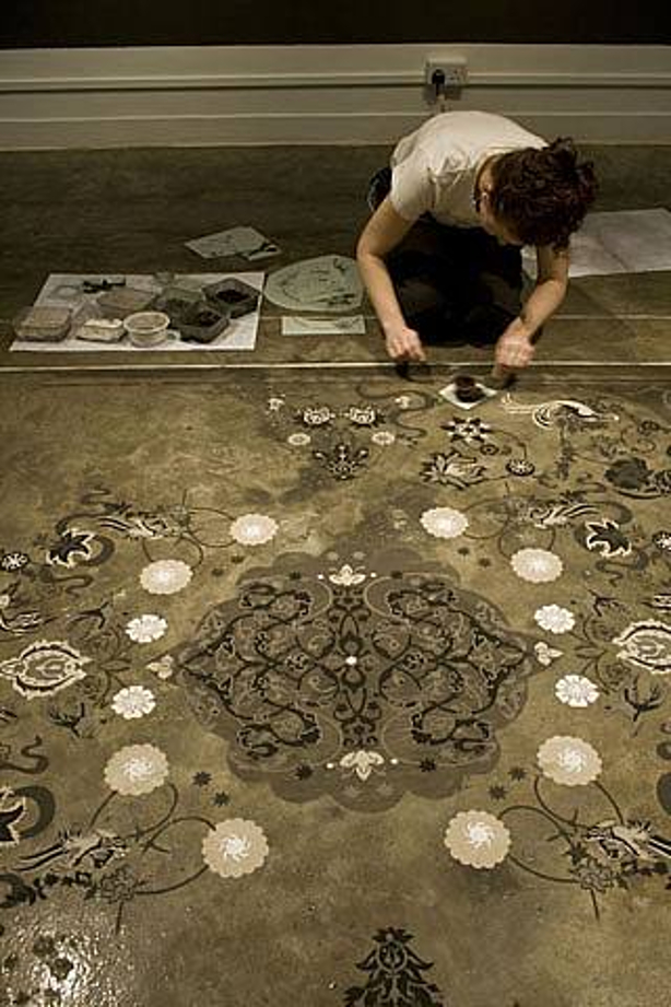 Hannah Bertram installing dust carpet entitled “An Ordinary Kind of Ornament” at “Fragments” exhibition at 10 Chancery Lane Gallery, Hong Kong