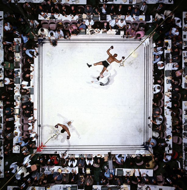 Aerial view of Muhammad Ali victorious after round 3 knockout of Cleveland Williams during fight at Astrodome, November 14