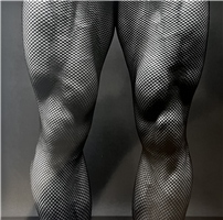 Roger Koch in Fishnet Stockings by Robert Mapplethorpe